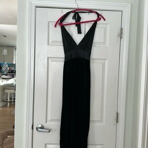 Woman’s black velvet jumpsuit by Chico size small